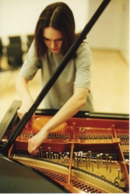 Isabel unpreparing her piano, 2001
